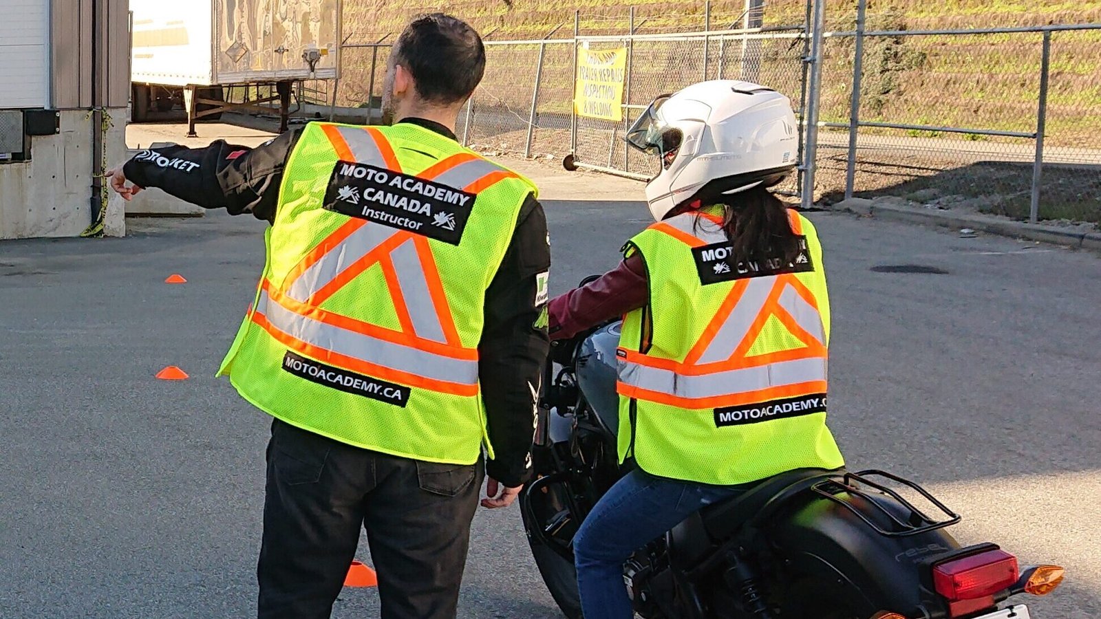 Instructor guiding a student