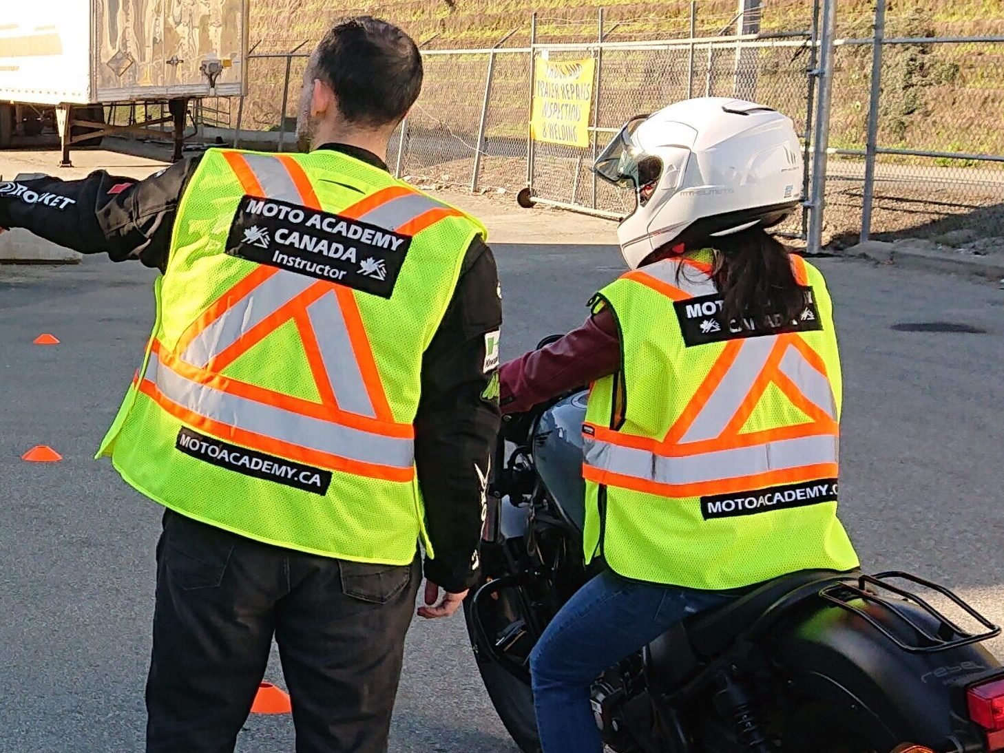 Instructor guiding a student